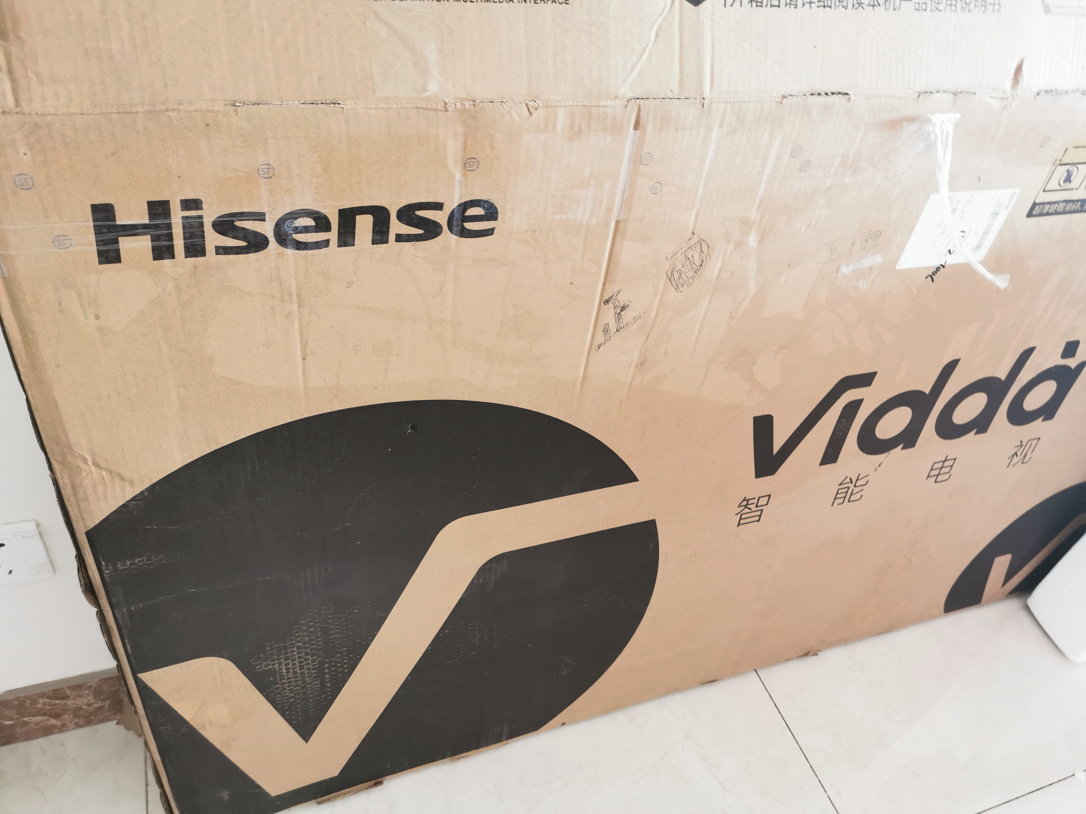 搬家用京东快递邮寄55寸液晶电视原包装邮寄收件后共同拆箱发现整个